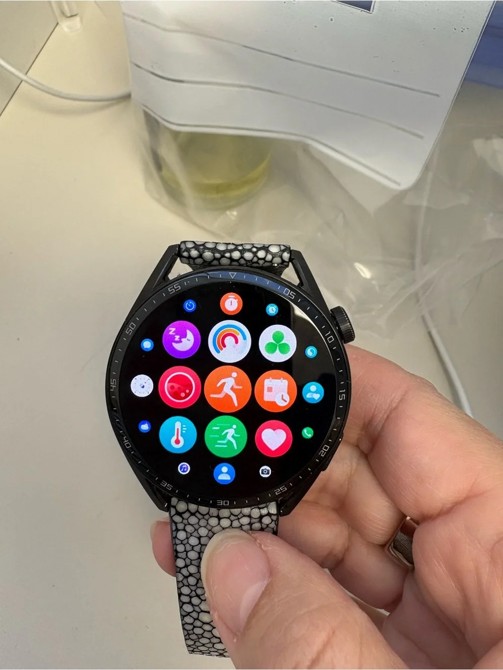 Huawei GT3 smartwatch with leather band and accessories
